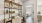 a room with shelves and books