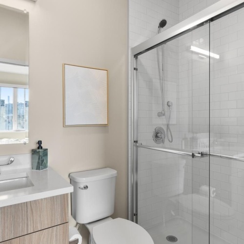 a bathroom with a glass shower