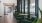 a room with green chairs and a table