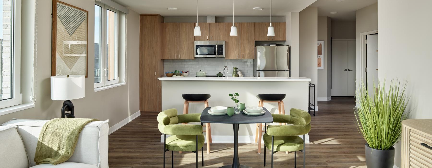 a living room with a table and chairs