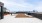 a large rooftop area with a city in the background